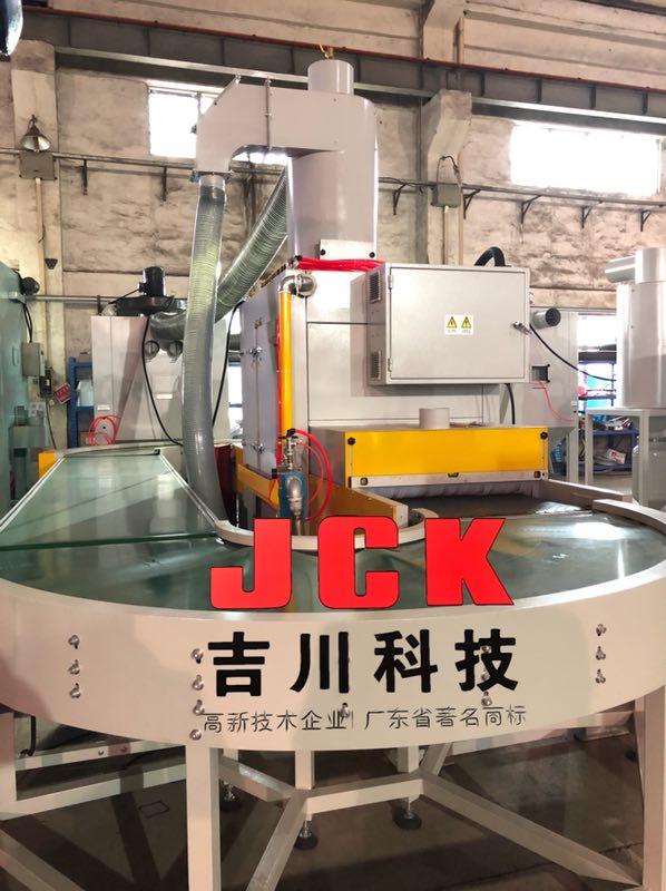 烤盤發(fā)熱盤自動噴砂機